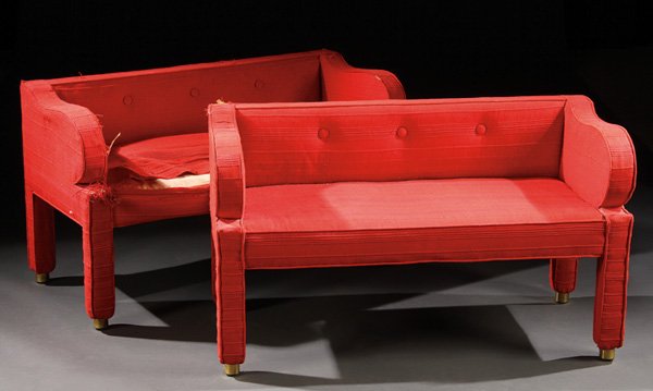 PETITE SOFAS, EDWARD WORMLEY FOR DUNBAR: A PAIR OF EDWARD WORMLEY FOR DUNBAR: PETITE SOFAS OR HALL SEATS, MID 20TH CENTURY. With later red upholstery. Height 23.5 inches (59.75 cm).
