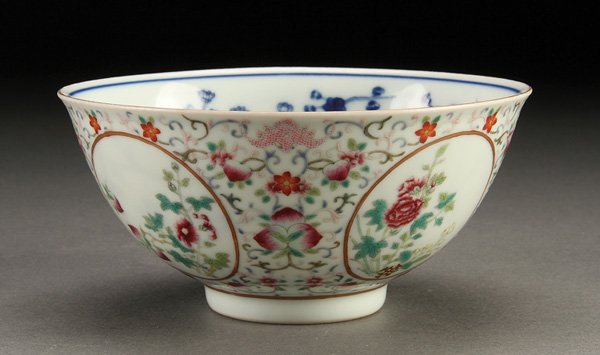 CHINESE FAMILLE ROSE PORCELAIN BOWL: A GOOD CHINESE FAMILLE ROSE AND BLUE WHITE PORCELAIN BOWL. The exterior finely painted with peaches, blossoms, and bats, surrounding four medallions, the interior with various Buddhist symbols surroun