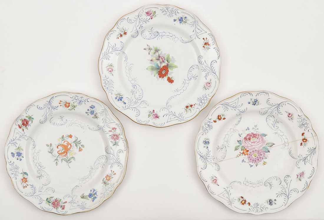3 IMPERIAL PORCELAIN PLATES, PERIOD OF NICHOLAS I: 3 IMPERIAL PORCELAIN PLATES, PERIOD OF NICHOLAS I. Comprising three Neo-Rococo plates with molded decorations and hand-painted flowers. The underside of one with blue underglaze mark of Nicholas I (re