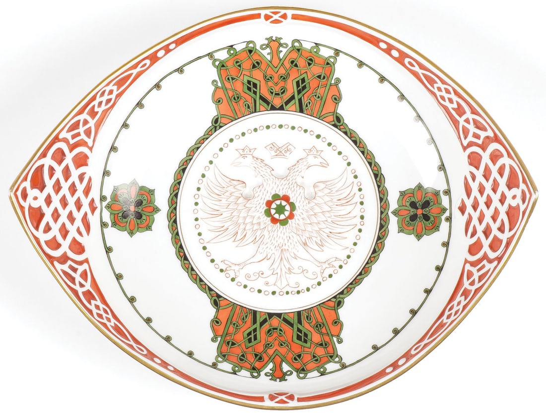 RUSSIAN KORNILOV PAN SLAVIC BOWL: RUSSIAN KORNILOV PAN SLAVIC BOWL. With raised strapwork decoration on a red ground. The cavetto with bas relief molded double headed eagle within a green and red strapwork frame. In the Pan Slavic tas