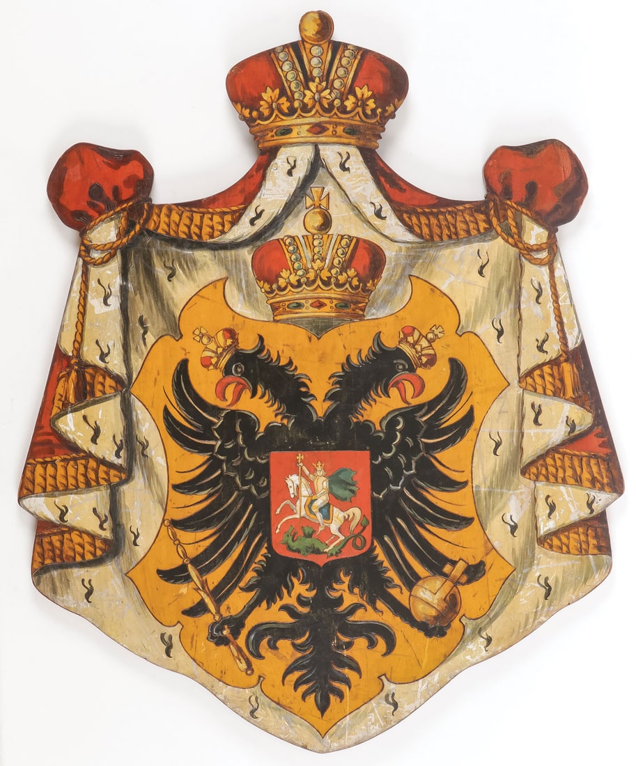 RUSSIAN POLYCHROME WOOD COAT OF ARMS, C 1900: RUSSIAN POLYCHROME WOOD COAT OF ARMS, C 1900. Comprising a shaped wood plaque with pyrography and polychrome decoration depicting the Imperial state seal of Russia. Initialed on verso and branded Stoc