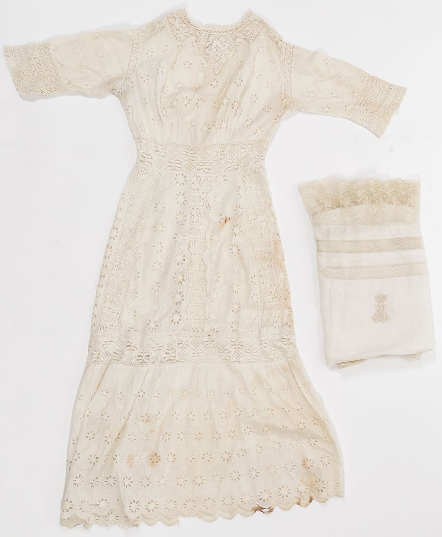 IMPERIAL RUSSIAN LACE, 19th CENTURY: IMPERIAL RUSSIAN LACE, 19th CENTURY. Comprising an ornate lace pillowcase with embroidered crowned cypher. 36 inches x 36 inches (91 x 91 cm). And a young women's lace dress, from hem to collar 51 inc