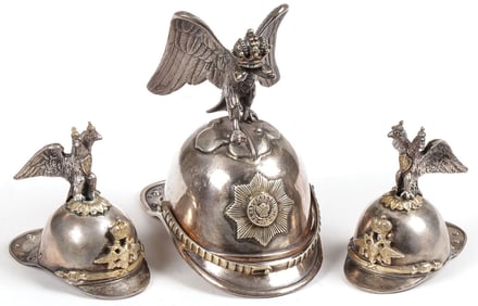 THREE RUSSIAN SILVER HELMET STIRRUP CUPS