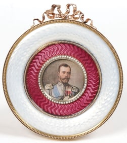 A FABERGE STYLE GOLD & ENAMELED PICTURE FRAME