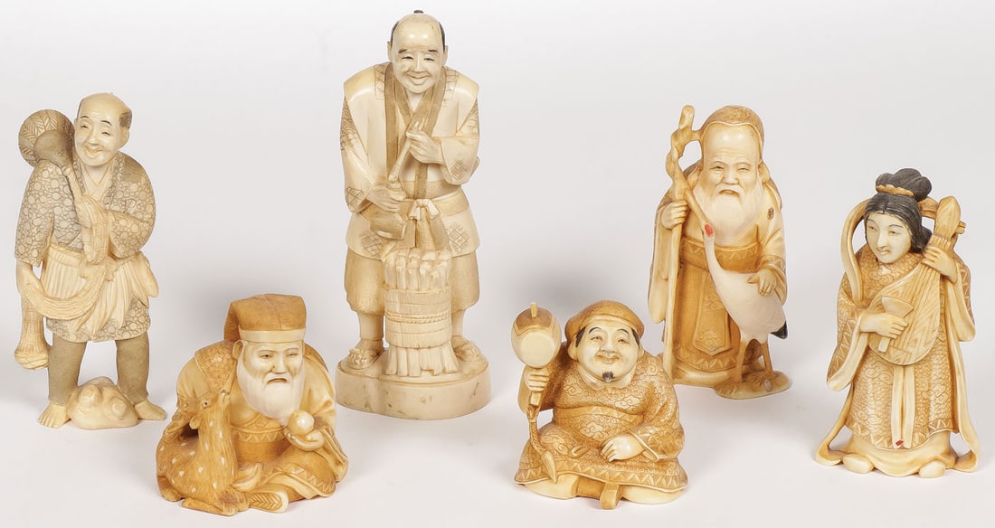 SIX JAPANSES CARVED OKIMONO, MEIJI: SIX JAPANSES CARVED OKIMONO, MEIJI. Including two larger examples modeled as farmers and the others modeled as four of the Seven Lucky Gods (Shichifukujin). Each example with incised signature on base