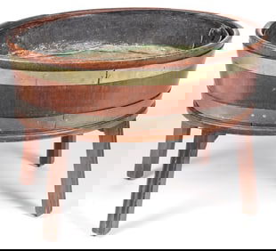 A GEORGE III MAHOGANY WINE COOLER