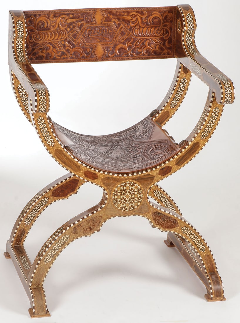 A GOOD SYRIAN SAVONAROLA INLAID CHAIR: A GOOD SYRIAN SAVONAROLA INLAID CHAIR. Of traditional design, overall heavily inlaid and with tooled leather seat and backrest. Height 34.7 inches, width 25.5 inches, depth 21 inches. LOCAL PICKUP OR 