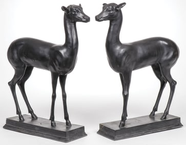 PAIR OF PATINATED BRONZE DEER