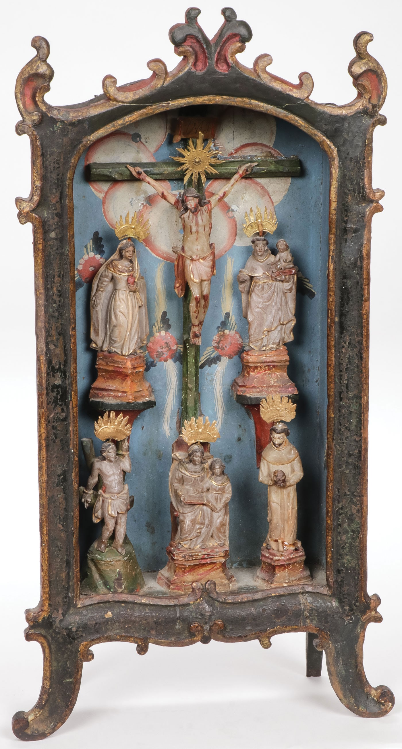CARVED ALABASTER SHRINE GROUPING, 18TH CENTURY: CARVED ALABASTER SHRINE GROUPING, 18TH CENTURY. Comprising a South German carved and polychromed alabaster shrine grouping. Comprising seven carved, polychrome, and gilt alabaster figures displayed in