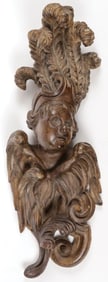 A CARVED WINGED WALL ORNAMENT, 19TH C