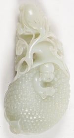A FINE CHINESE CARVED JADE AMULET, QING