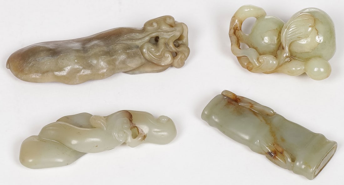 FOUR CHINESE CARVED JADE PENDANTS, QING (1 of 2)