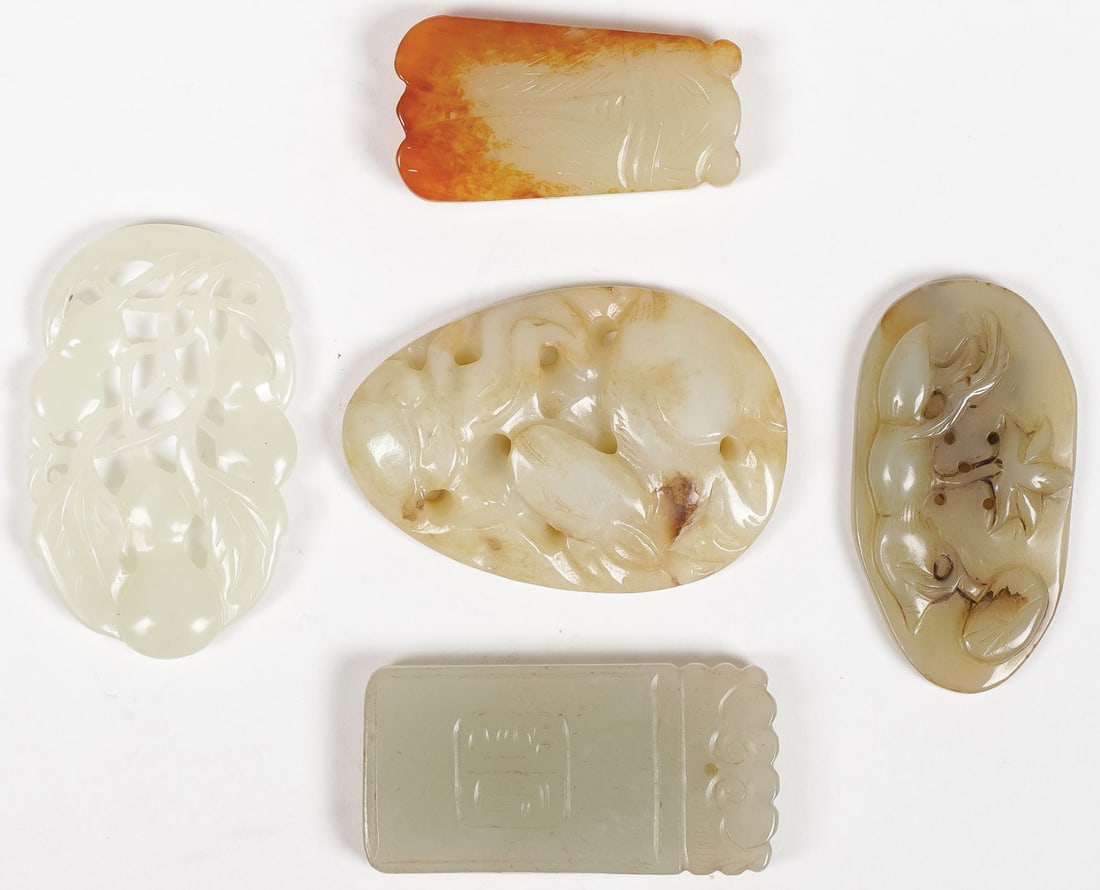 FIVE CHINESE CARVED JADE PENDANTS, QING (1 of 2)