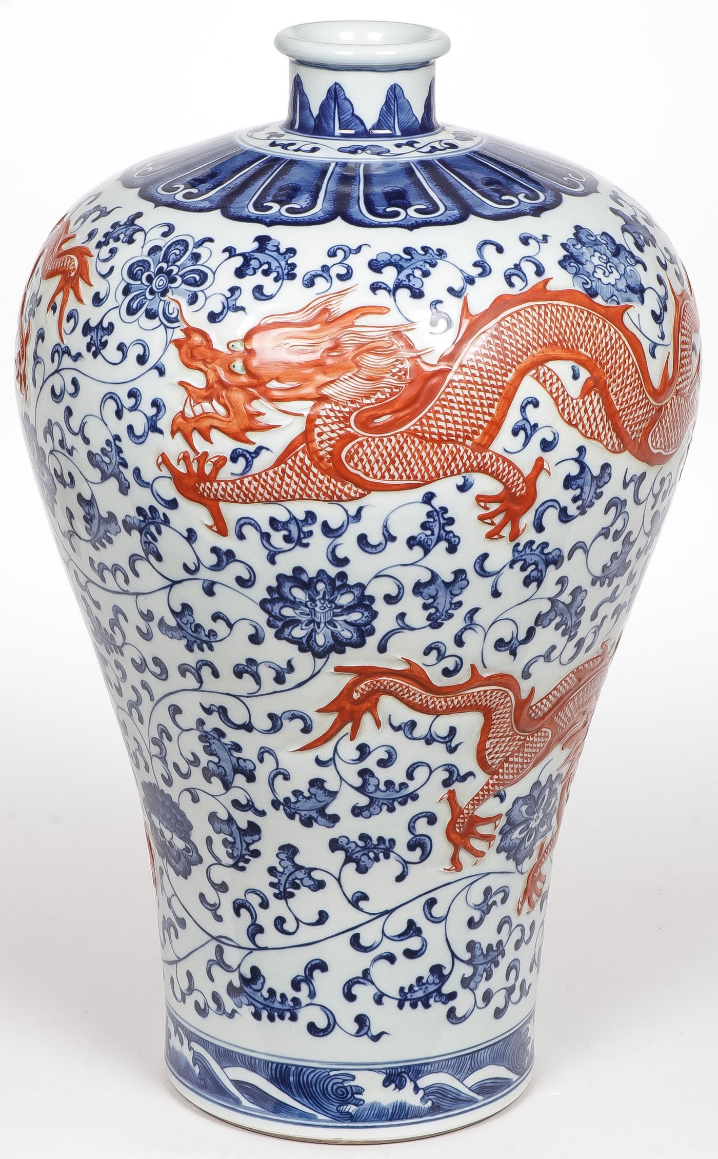 LARGE CHINESE PORCELAIN VASE: LARGE CHINESE PORCELAIN VASE. Comprising a large and impressive Meiping form vase with scrolling lotus decoration in blue glaze and red raised dragons. Underside with blue underglaze archaic six-chara