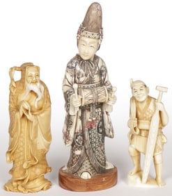 THREE CARVED FIGURES, C. 1920