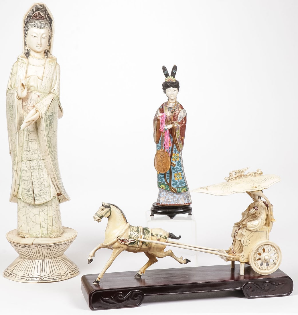 INTERESTING ASIAN SCULPTURE GROUP: INTERESTING ASIAN SCULPTURE GROUP. Comprising three individual pieces including a large bone carved and laminated Guanyin, a cloisonné and maiden holding fan and a horse drawn maiden on conformin