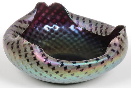 LARGE AUSTRIAN ART GLASS BOWL, C. 1900: LARGE AUSTRIAN ART GLASS BOWL, C. 1900. Comprising a large amethyst iridescent bowl with crimped rim and overall swirl diamond pattern and ground pontil. Probably Rindskoph. Height 4.75 inches (12cm).