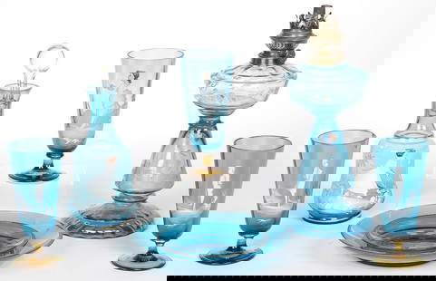 GOOD VINTAGE MARY GREGORY GLASS: GOOD VINTAGE MARY GREGORY GLASS. Comprising seven individual pieces in sapphire blue including a scarce oil lamp, a decanter with stopper, three goblets with amber colored feet and two plates. Greates