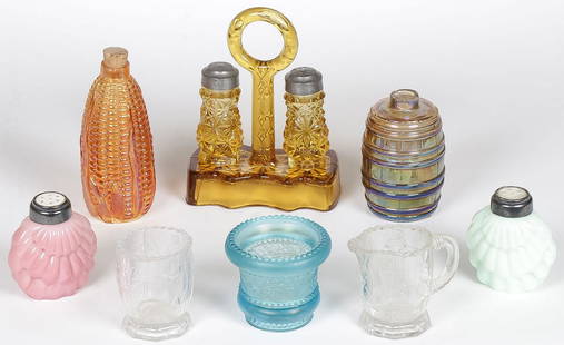 GOOD AMERICAN PATTERN GLASS GROUP: GOOD AMERICAN PATTERN GLASS GROUP. Comprising 8 individual pieces including an EAPG salt and pepper set in Amber, a scarce carnival glass corn bottle, a carnival glass whiskey bottle, clam shell shake
