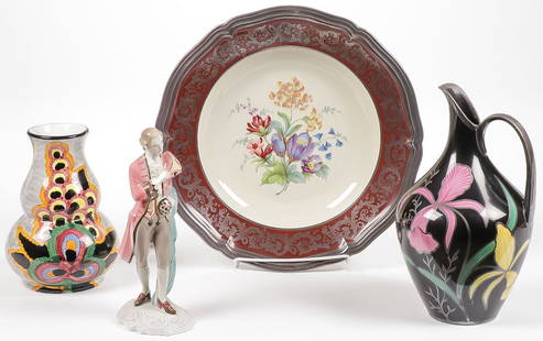 VINTAGE GERMAN PORCELAIN GROUP: VINTAGE GERMAN PORCELAIN GROUP. Comprising four individual pieces including a wheelock "Black Forest" gourd shaped vase, a Goldscheider figure of a man, a Rosenthal Chippendale silver overlayed charge