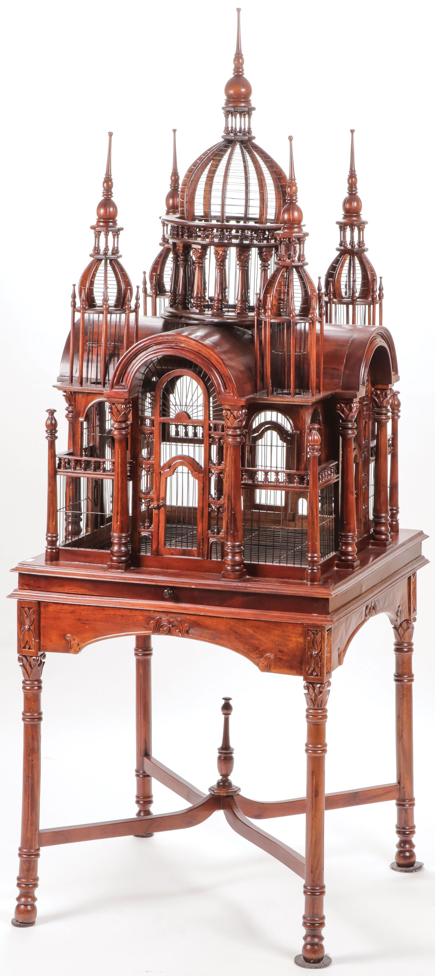 ORNATE WOOD BIRD CAGE & STAND: ORNATE WOOD BIRD CAGE & STAND. Comprising a large ornate and complex bird cage constructed as a cathedral with arched domes and spires, pullout cleaning drawer and four-legged conforming stand with sc
