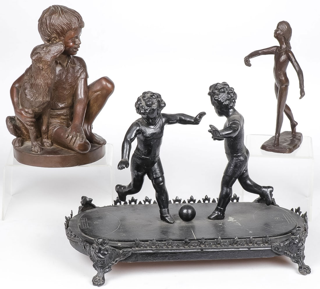 INTERESTING SCULPTURE GROUP: INTERESTING SCULPTURE GROUP. Comprising three individual pieces, including a patinated bronze grouping of a boy and his dog, signed Parks and dated 74. Together with an interesting cast metal sculptur