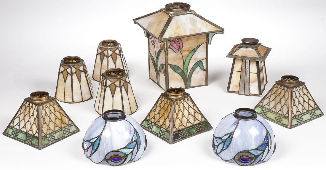 10 ARTS-N-CRAFTS LEADED SHADES: 10 ARTS-N-CRAFTS LEADED SHADES. Comprising two matching groups of three leaded shades and a matching set of two. Fitter ring sizes: largest shade 3 inches, the rest approximately 2 inches. NO RESERVE.