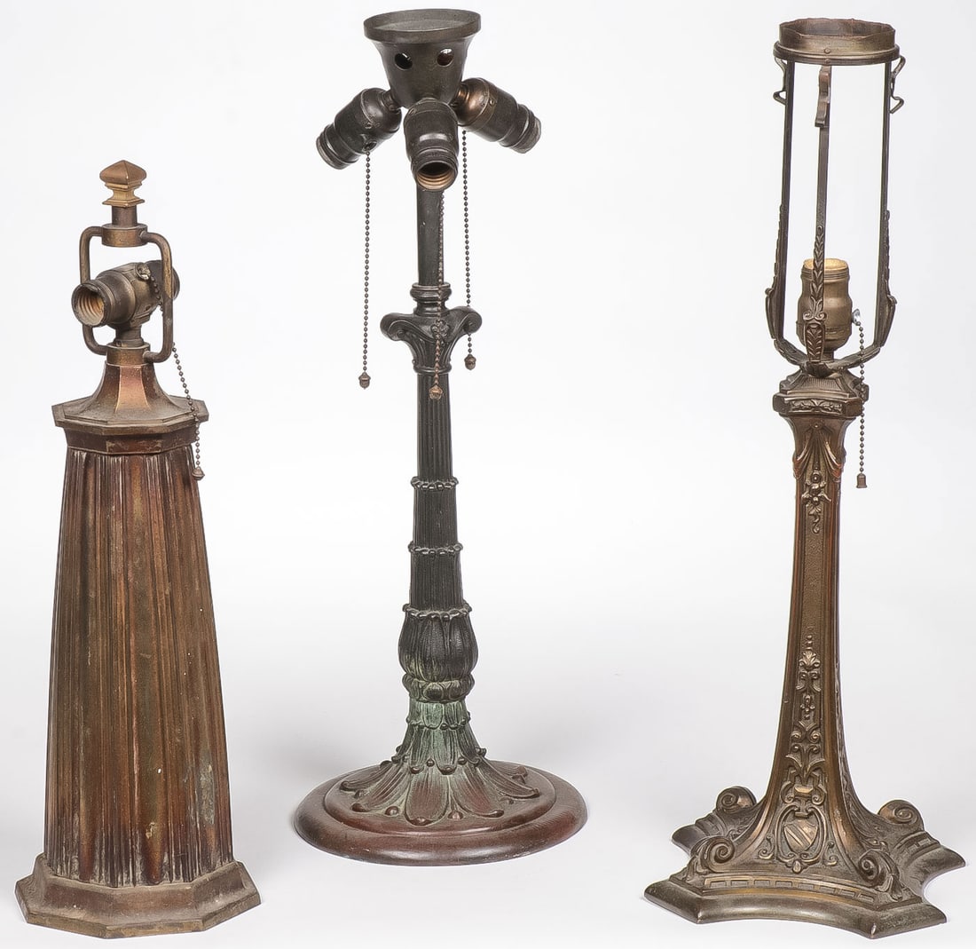 3 VINTAGE TABLE LAMP BASES: 3 VINTAGE TABLE LAMP BASES. Including an interesting gilt metal ribbed example (left), a Wilkinson marked base (center), and another, as shown. All need rewiring. Greatest height 24 inches. NO RESERVE