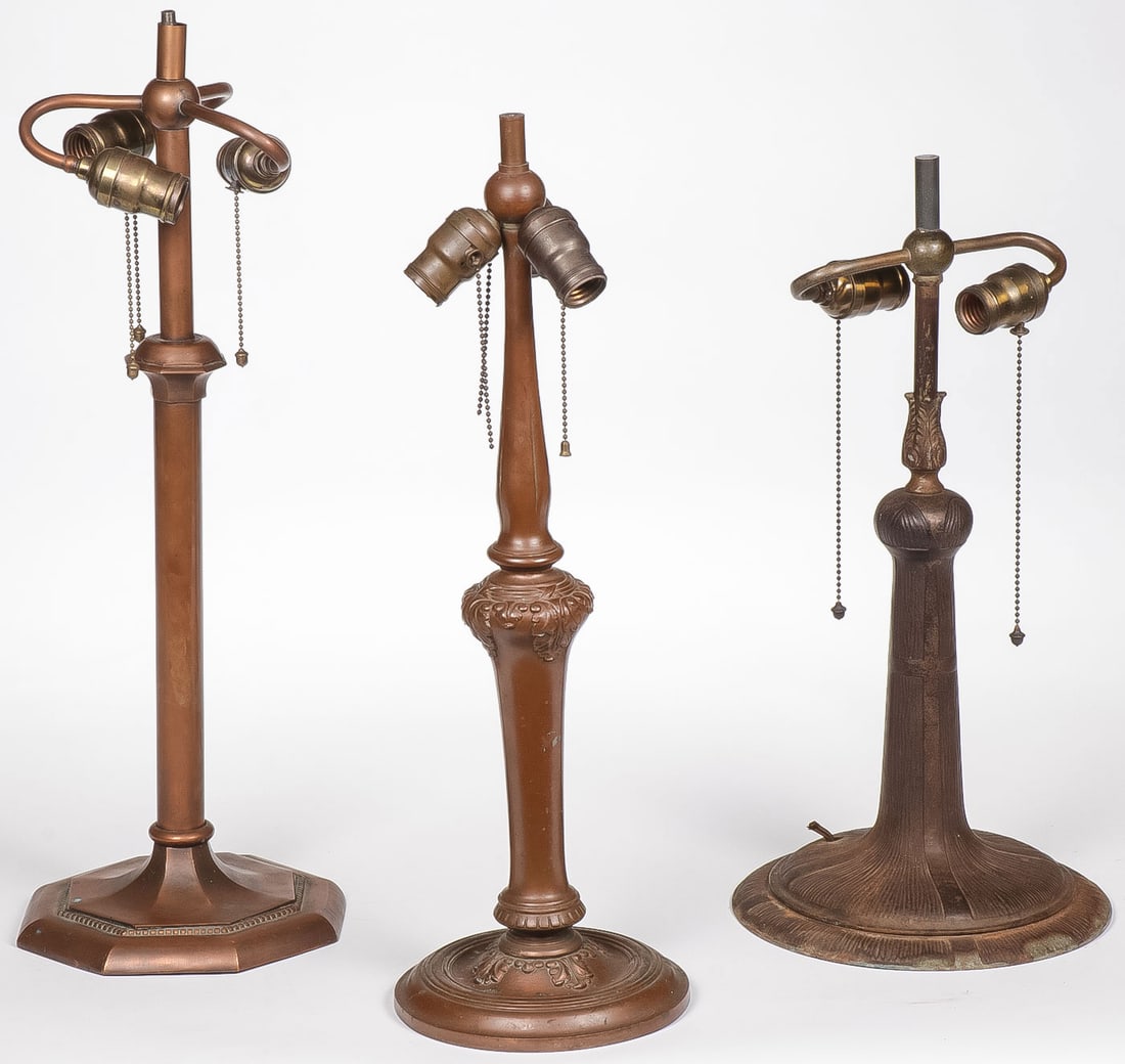 3 VINTAGE TABLE LAMP BASES: 3 VINTAGE TABLE LAMP BASES. The first with three sockets and copper body and example on far right being cast iron. All need rewiring. Greatest height 24.5 inches. NO RESERVE.SHIPPING NOTICE:Except f