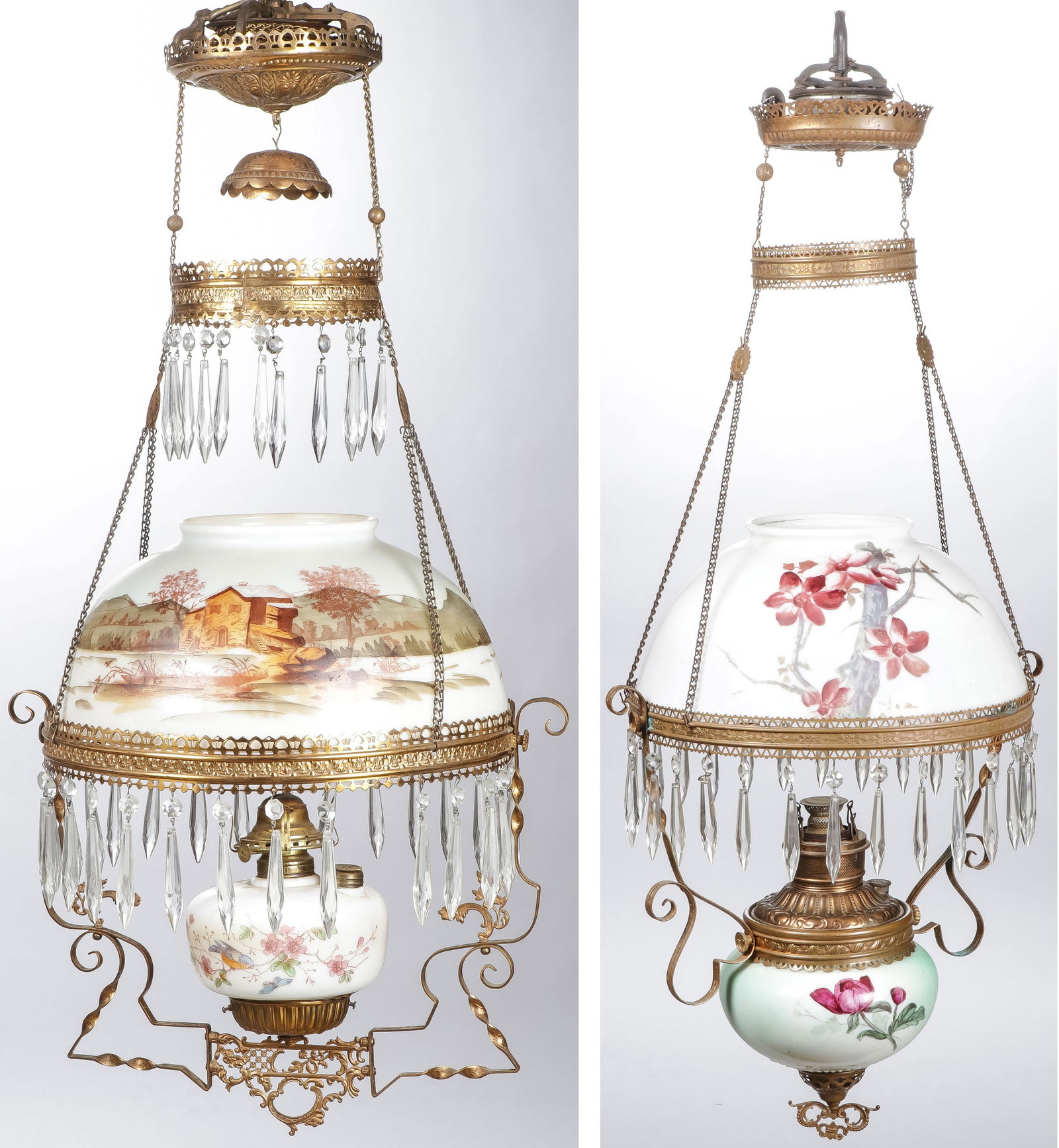 PR VICTORIAN HANGING PARLOR LAMPS: PR VICTORIAN HANGING PARLOR LAMPS. Each with painted shade and oil reservoir. Both with adjustable chains. Overall height about 38 inches. NO RESERVE. SHIPPING NOTICE: Except for large, oversized item