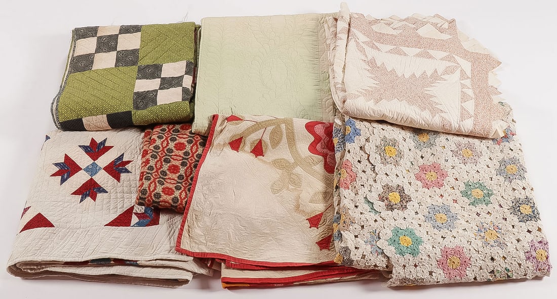 SEVEN ANTIQUE AMERICAN QUILTS: SEVEN ANTIQUE AMERICAN QUILTS. Comprising seven vintage antique quilts of various patterns as shown, standard sizes. Provenance: From the estate of noted antique dealer Paul Brenner (1952-2024) Spenc