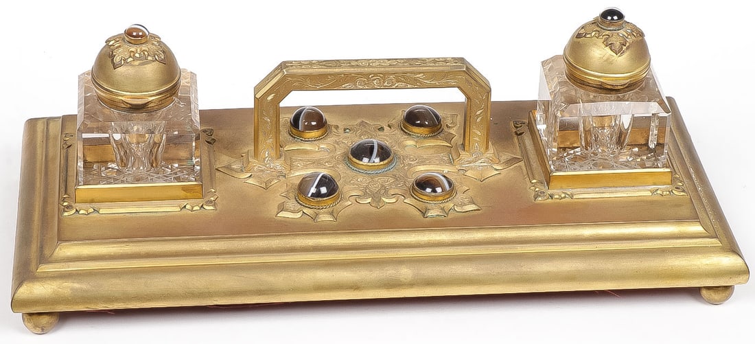 IMPRESSIVE GILT BRONZE & AGATE INKWELL: IMPRESSIVE GILT BRONZE & AGATE INKWELL. Comprising a large and imposing English or Scottish gilt bronze inkwell on ball feet with original glass cut glass inkwells and hinged covers and overall decora
