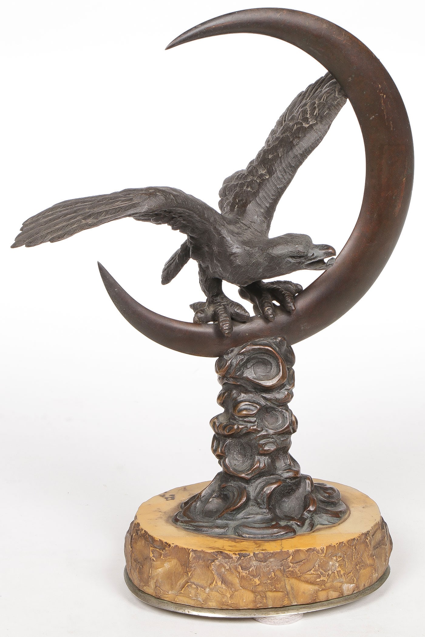 PATINATED EAGLE WATCH STAND, 19TH?C: PATINATED EAGLE WATCH STAND, 19TH?C. Comprising a finely sculpted patinated bronze spread-winged eagle on crescent moon atop tree trunk resting on a sienna marble base, the beak of eagle designed to h