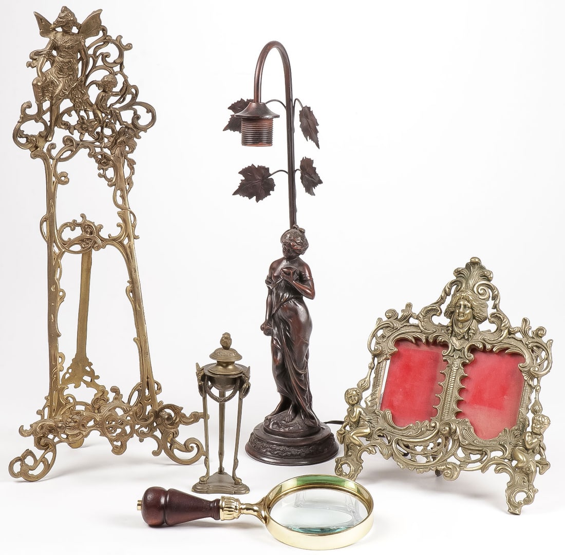 GOOD BRASS & METAL GROUPING, 19TH & 20TH C: GOOD BRASS & METAL GROUPING, 19TH & 20TH C. Comprising an ornate cast brass desk easel in the Art Nouveau taste with winged nymph at top, a bronzed metal female figural lamp, a finely cast brass doubl