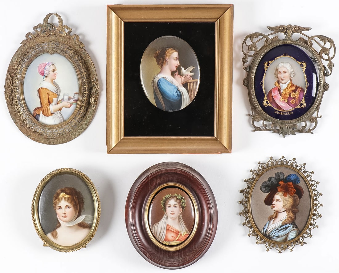 6 MINIATURE PORCELAIN PORTRAITS: 6 MINIATURE PORCELAIN PORTRAITS. Comprising six individual portraits on oval porcelain plaques and in various types of frames. Greatest frame height 6.75 inches (17cm) NO RESERVE.Provenance: The Doc