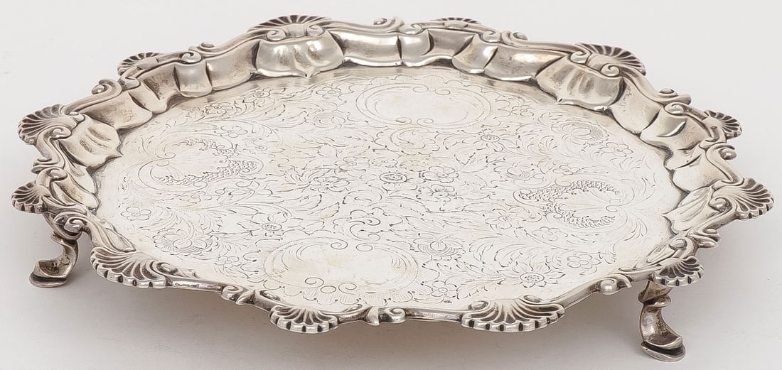 RARE DOROTHY MILLS, GEORGE II SILVER SALVER: RARE DOROTHY MILLS, GEORGE II SILVER SALVER. Comprising a silver footed salver with rocaille scalloped rim and chased cavetto, makers mark for Dorothy Mills,? London hallmark, and date mark somewhat i
