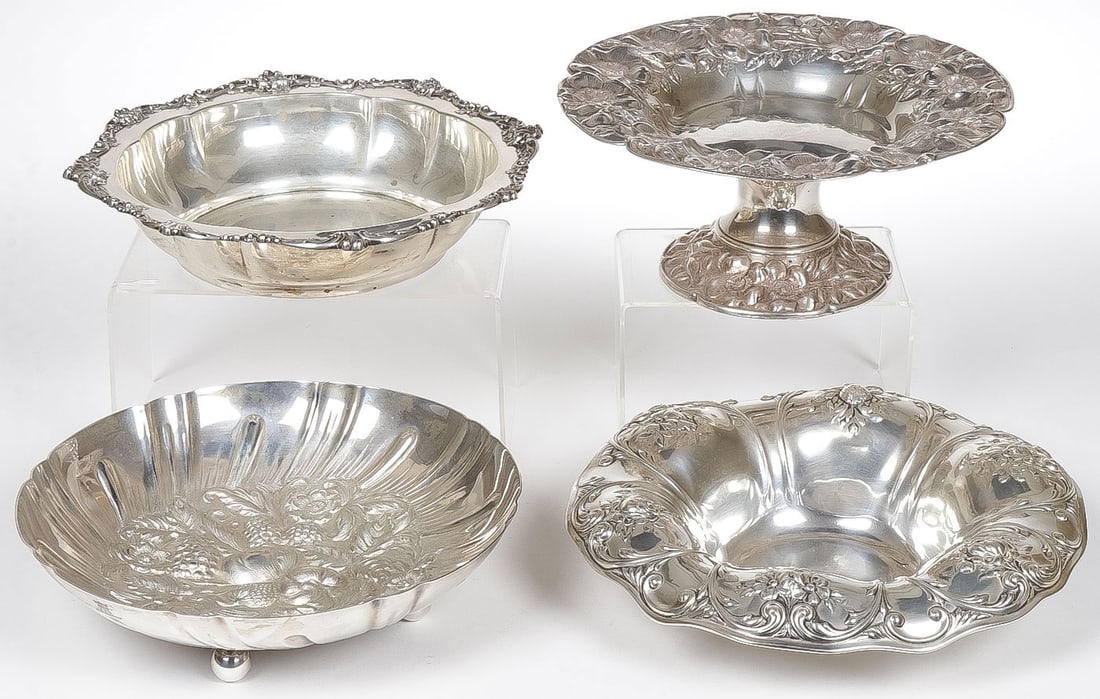 4 PIECES OF STERLING SILVER: 4 PIECES OF STERLING SILVER. Comprising a Gorham sterling bowl with rocaille scroll rim, an ornate footed compote, a S. Kirk and Sons heavily repoussed bowl on ball feet, and a Gorham bowl with draped