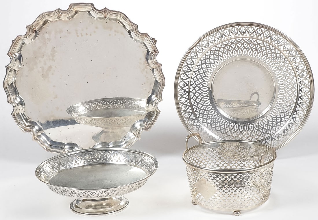 GOOD TIFFANY STERLING SILVER GROUP: GOOD TIFFANY STERLING SILVER GROUP. Comprising four individual pieces including a large footed tray with scalloped rim, a large pierced circular tray, a footed compote with pierced rim and a basket ho