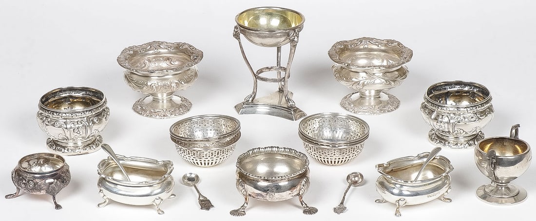 VINTAGE SILVER SALTS: VINTAGE SILVER SALTS. Comprising three matching sets, 6 matching silver baskets, and 4 individual salts as well as 4 sterling salt spoons. Of various shapes, sizes and makers including both American a