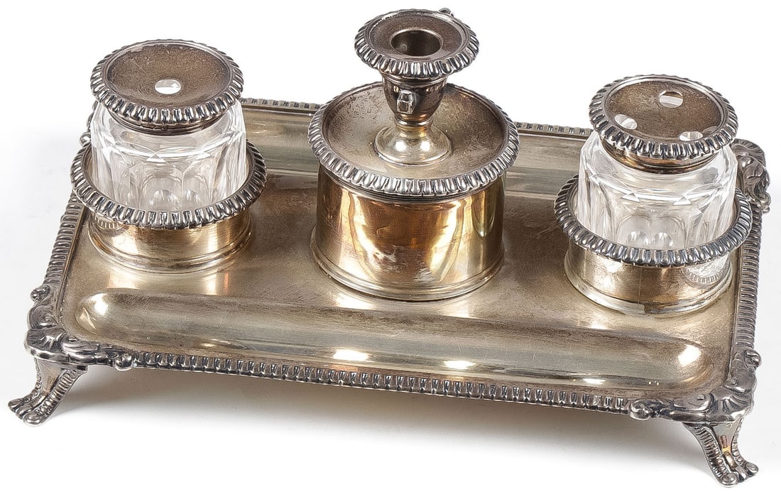 ENGLISH GEORGE III SILVER INKSTAND: ENGLISH GEORGE III SILVER INKSTAND. Comprising a footed silver inkstand with original glass inserts, makers mark of John Roberts & Co, Sheffield, circa 1810. length 9 inches. NO RESERVE. Provenance: