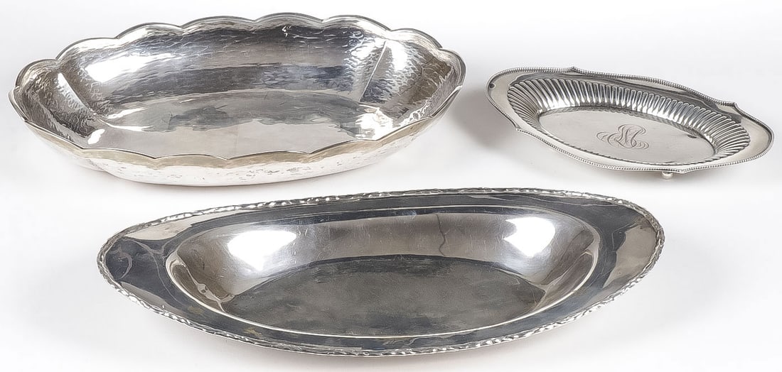 3 STERLING SILVER TRAYS: 3 STERLING SILVER TRAYS. Comprising an oval S. Kirk & Son bread tray, marked 925/1000, a hand hammered oval silver bowl with scalloped rim, underside marked .925 and a small Gorham sterling tray on ba