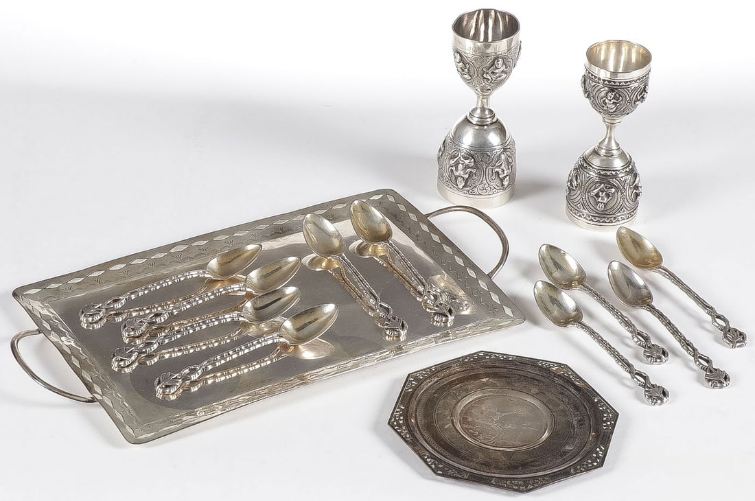 MIXED ASIAN/INDIAN SILVER GROUP: MIXED ASIAN/INDIAN SILVER GROUP. Comprising a pair of silver double egg cups, 10 silver bamboo handled spoons, total weight 390 grams. Together with a low-grade silver or silver plated rectangular han