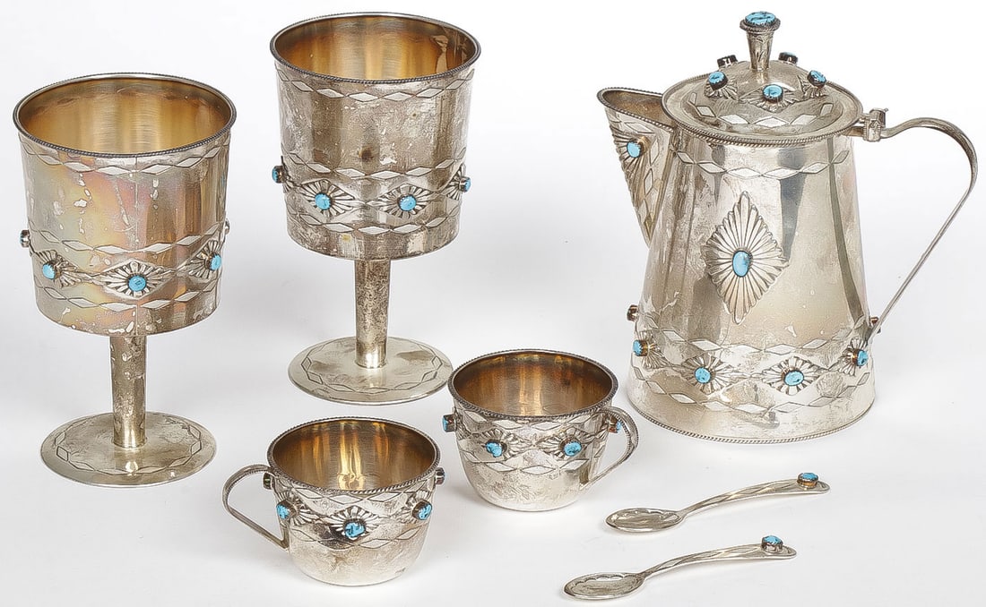 MEXICAN OR SOUTHWEST STERLING SERVICE: MEXICAN OR SOUTHWEST STERLING SERVICE. Comprising an interesting, engraved sterling silver and turquoise decorated service comprising a teapot, 2 cups, 2 footed goblets and 2 spoons, all similarly dec