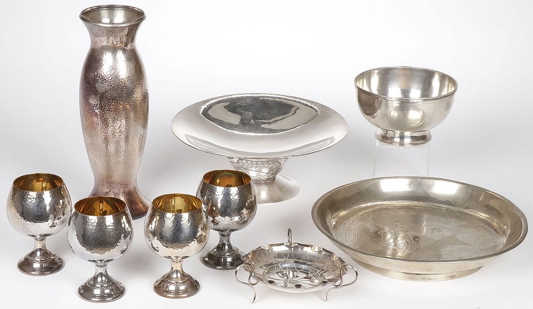 ASIAN MIXED METAL GROUP INCL SILVER: ASIAN MIXED METAL GROUP INCL SILVER. Comprising nine individual pieces including a good silver footed bowl (top center) a silver-hammered vase with rose (top left) four silver hammered footed goblets 