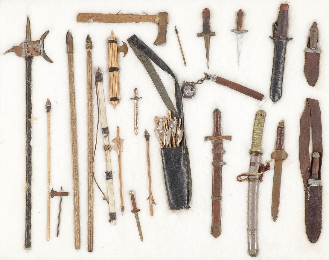 ANTIQUE MINIATURE WEAPONS: ANTIQUE MINIATURE WEAPONS. Comprising 23 individual miniature weapons including swords, daggers, spears, an axe, a mace, and bow and arrow, as shown, greatest length 10.25 inches. NO RESERVE.SHIPPING