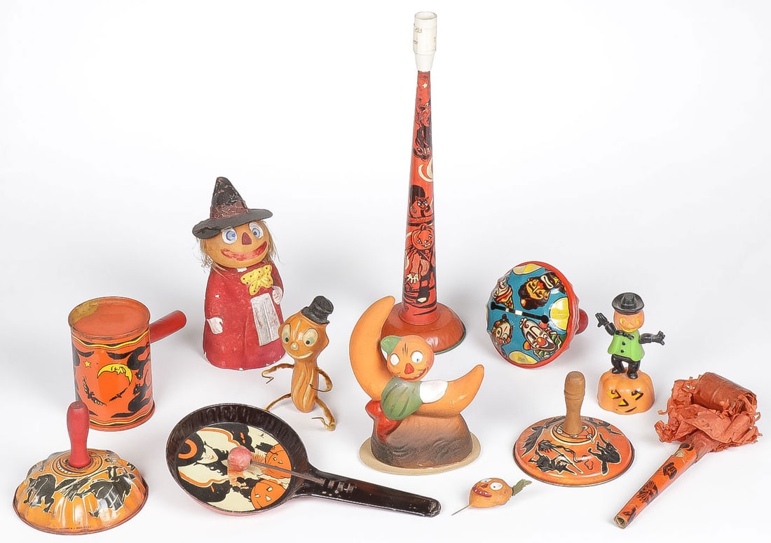 VINTAGE HALLOWEEN TOYS: VINTAGE HALLOWEEN TOYS. Comprising 12 vintage items including a pumpkin head witch candy container, a German marked watermelon and bobble pumpkin head candy container, a vintage peanut form pumpkin pl