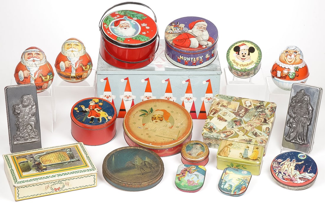 17 TIN LITHO CHRISTMAS CONTAINERS: 17 TIN LITHO CHRISTMAS CONTAINERS. Comprising a good and diverse group as shown, including two modern tin Roly-Poly examples and two English 1950's space themed tins as shown. Greatest length 18.5 inc