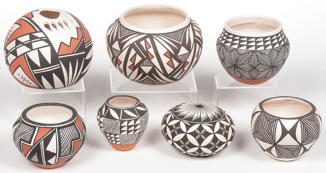 7 ACOMA POLYCHROME VESSELS: 7 ACOMA POLYCHROME VESSELS. Comprising various shapes and sizes each piece singed or initialed including a Patricio seed jar and other names including R. Poncho, Valdo, and Vallo, all in good conditio