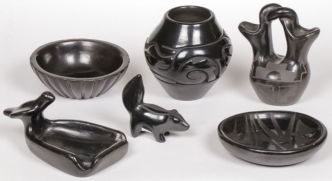 6 PCS SANTA CLARA BLACKWARE: 6 PCS SANTA CLARA BLACKWARE. Comprising six individual pieces including a carved vessel (center) signed Stella Chavarria, a ribbed bowl (lower left) singed Mary Eckleberry, and other pieces as shown. 