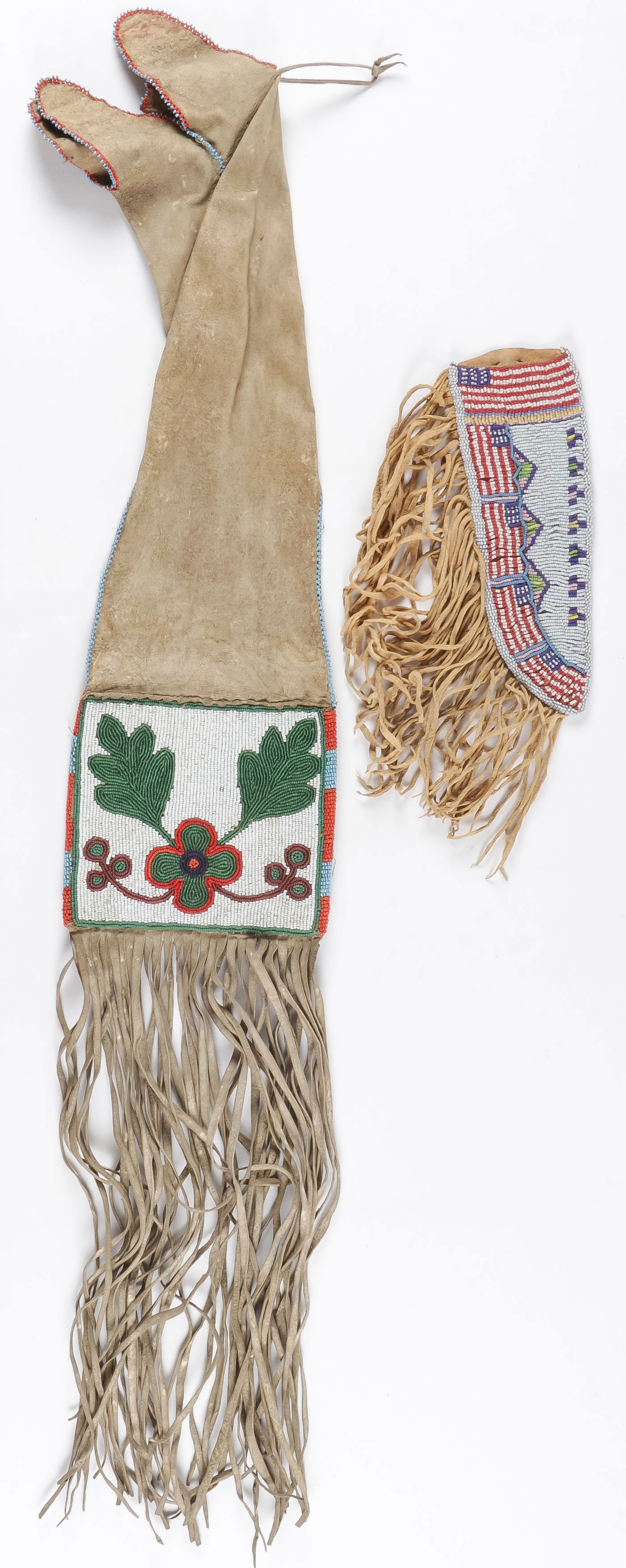 PLAINS BEADED PIPE BAG & SHEATH: PLAINS BEADED PIPE BAG & SHEATH. Comprising a good plains beaded pipe bag, sinew sewn, native tanned hide with four finger opening and tassels, circa 1915, length 39.5 inches. Together with a likely l